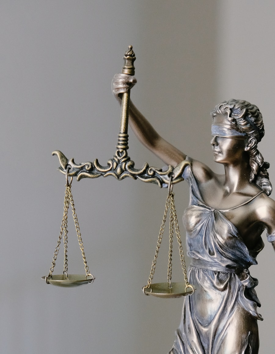 Lady Justice, bronze figure holding scales and sword